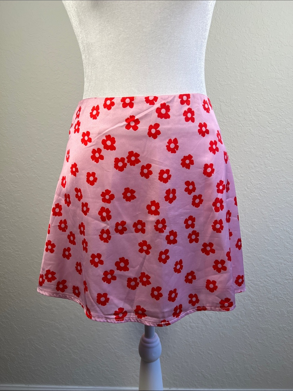 Princess Polly Pink mini skirt with red